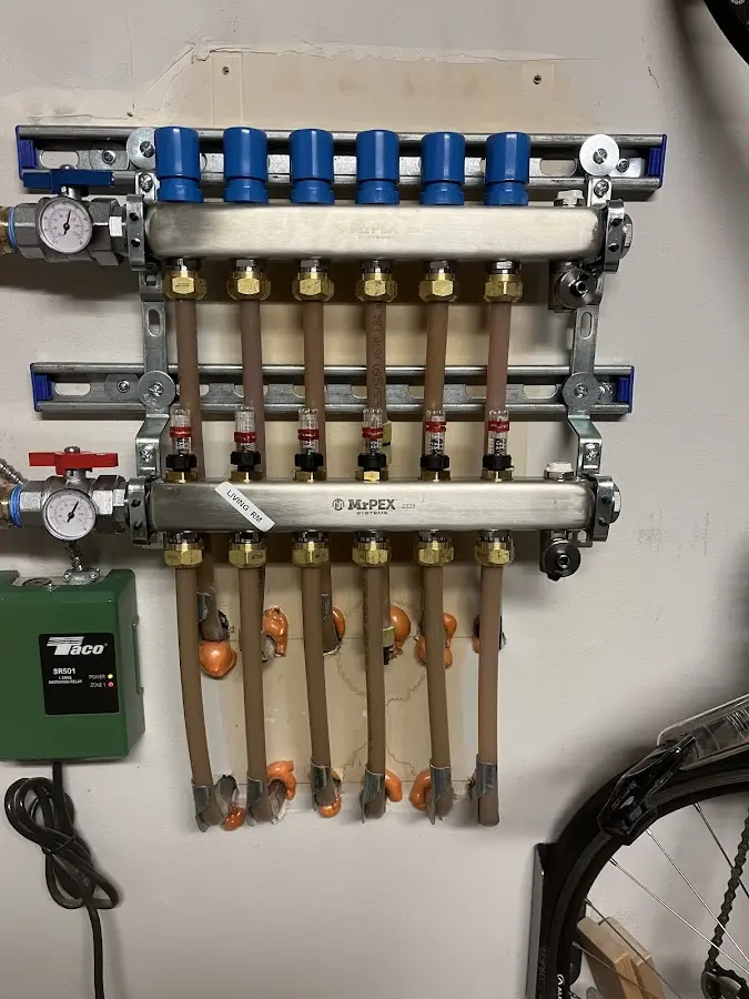 Plumber performing Water Heater Repair at a residential property in Wildwood